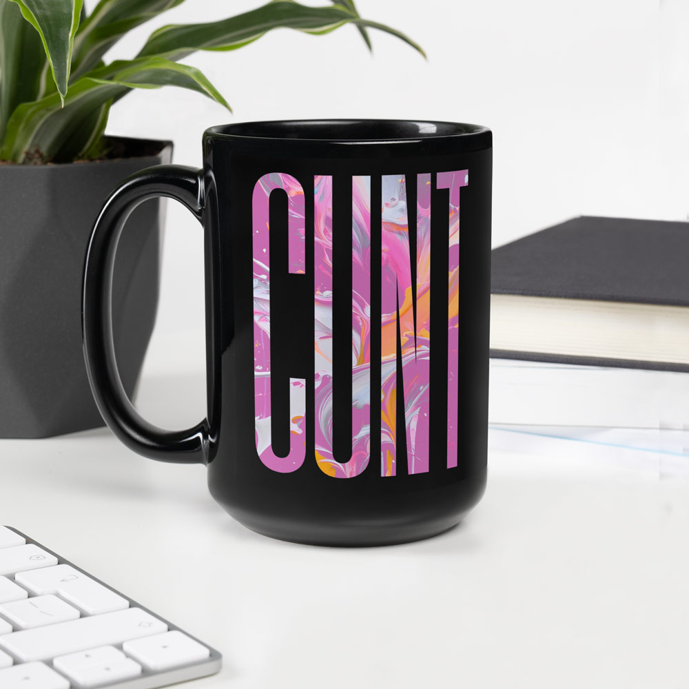 Gayer Things queer streetwear mug on a desk with keyboard and plants — bold pride merch for home or office