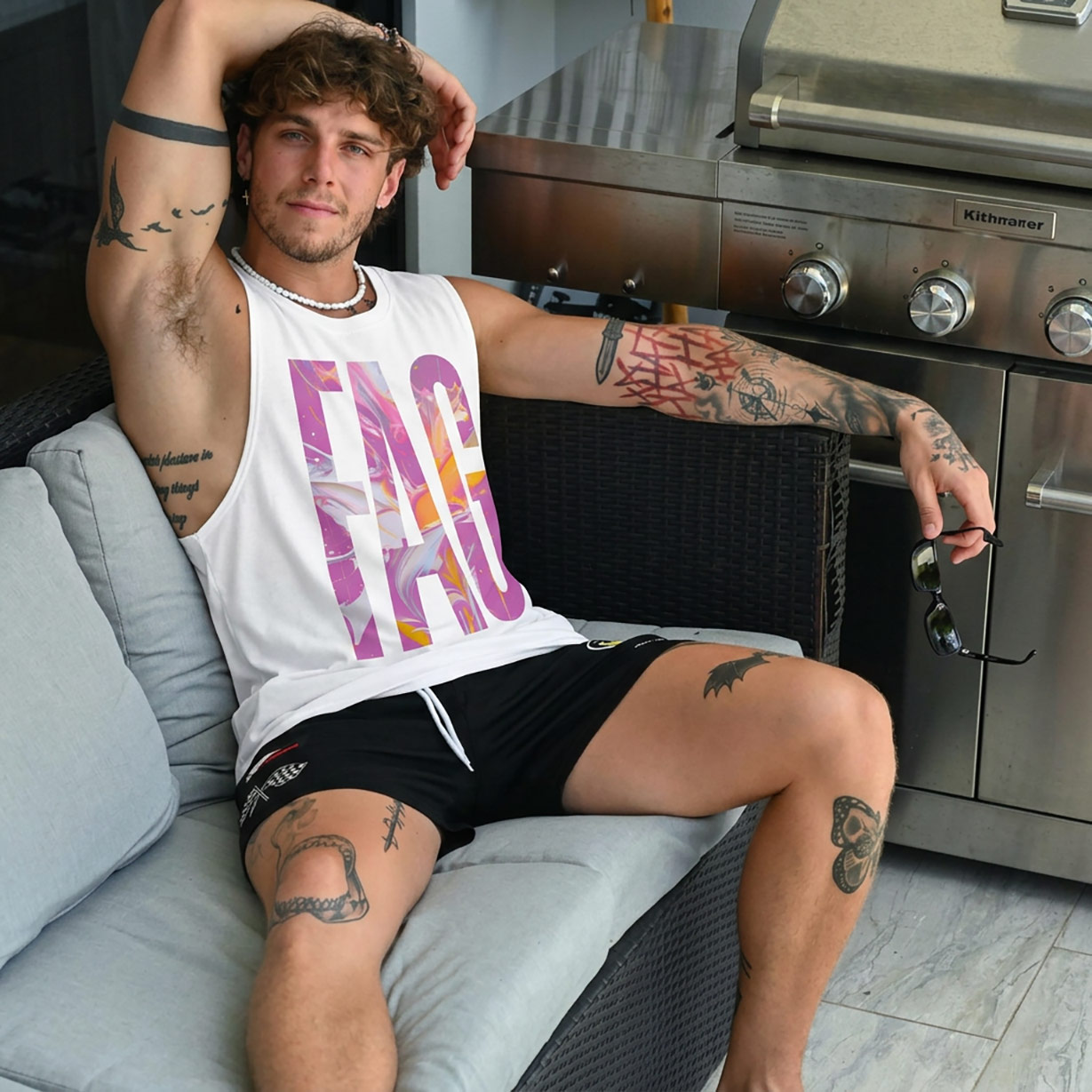 White sleeveless muscle tee with bold reclamation lettering — Gayer Things queer streetwear