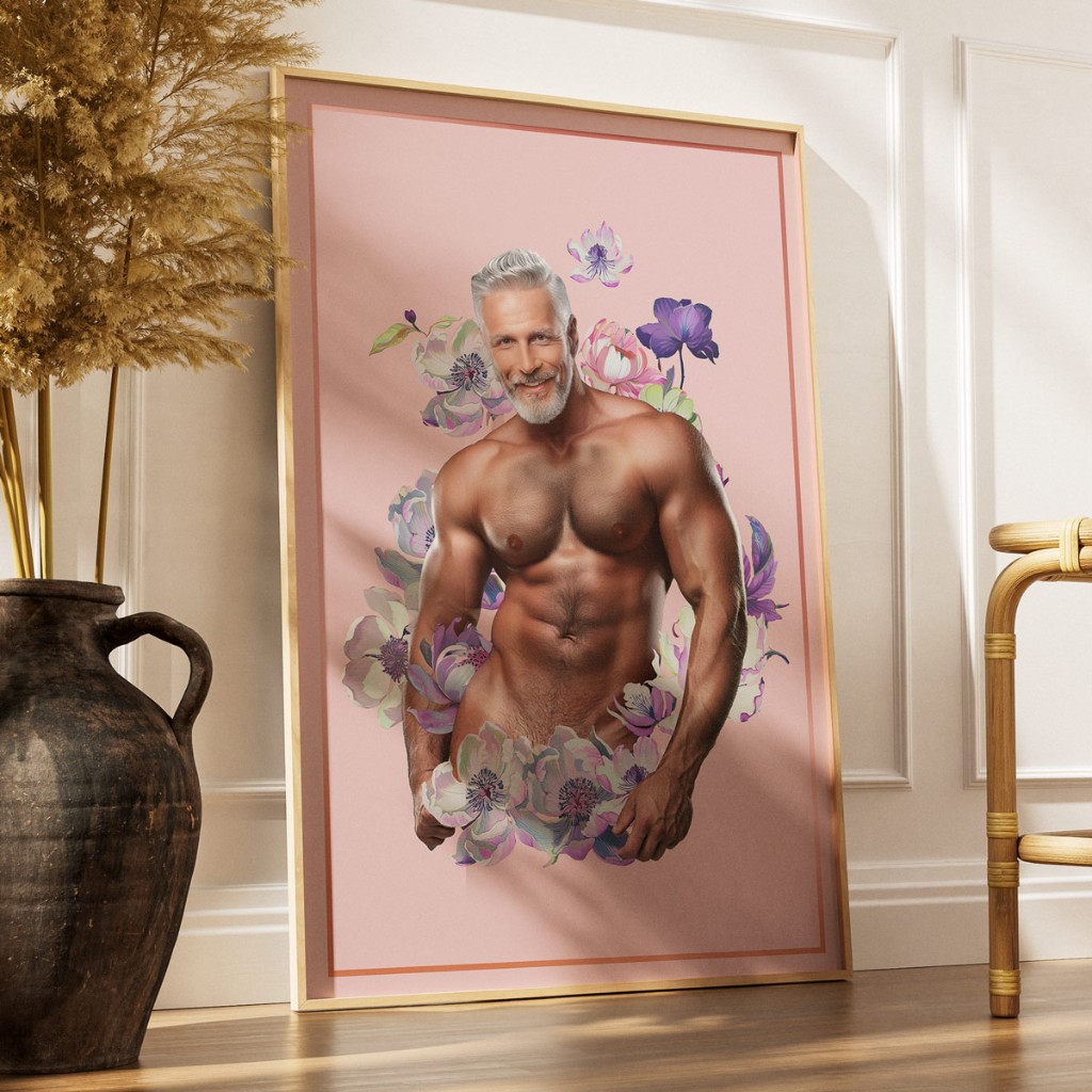 Framed Himbo Dan poster in bright interior with pampas grass — gold frame, lavender florals, lifestyle queer home decor