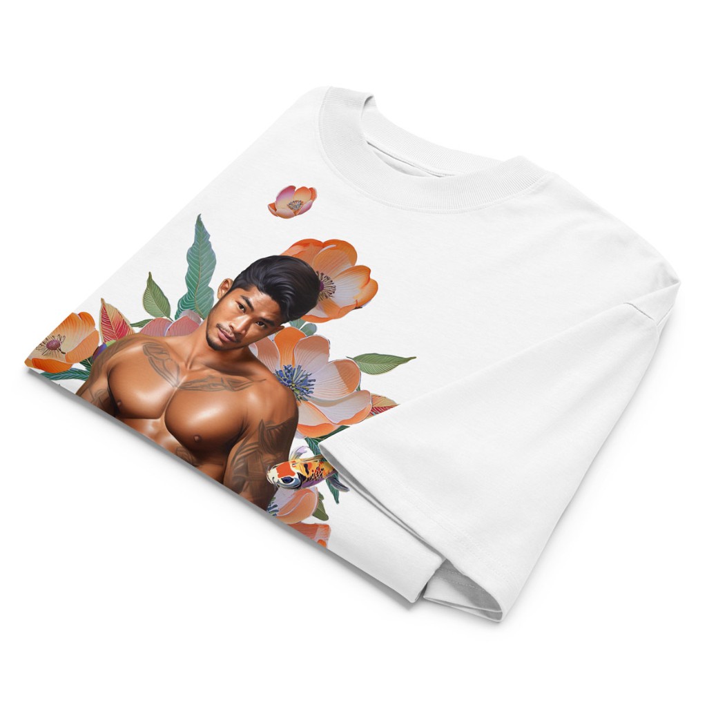 Folded white Himbo Dustin oversized organic cotton tee flat lay — vibrant floral koi artwork and ribbed collar